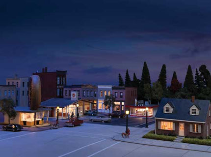 Walthers Cornerstone 933-4704 Brick Cape Cod House Spaces HO Scale - house with lit interior in night street scene