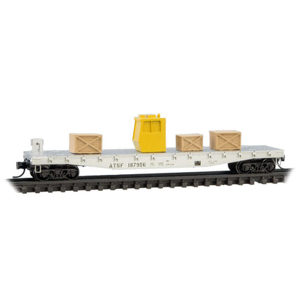 N Scale Micro-Trains Santa Fe MOW flat car with yellow load and wooden crates, perfect for model train setups.