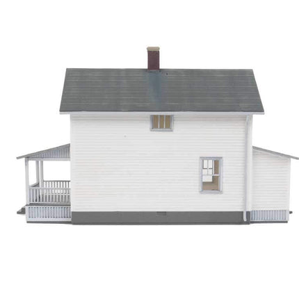 Walthers Cornerstone 933-3790 | Company House (2-Pack) | HO Scale model house side view with porch and tarpaper roof.