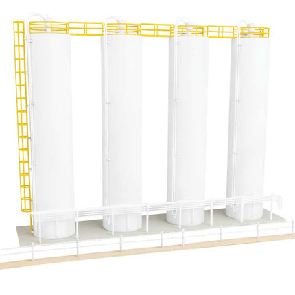 Walthers Cornerstone plastic pellet plant model featuring four silos with yellow ladders and railings.