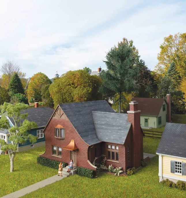 Walthers Cornerstone 933-4250 | Tudor House – Plastic Building Kit | HO Scale displayed in a scenic neighborhood layout.