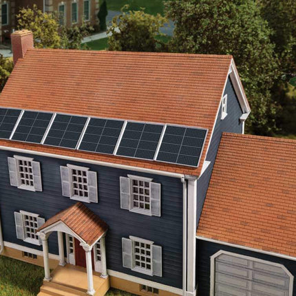 Walthers SceneMaster 949-4196 | Rooftop Solar Panels - Plastic Building Kit | HO Scale on a model house.