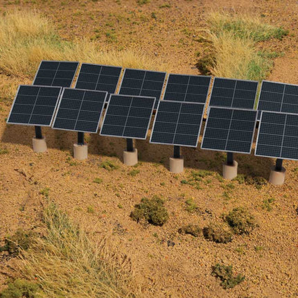 Walthers SceneMaster 949-4196 | Rooftop Solar Panels - Plastic Building Kit | HO Scale set on a desert landscape.